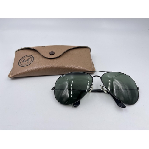 2339 - A cased pair of Ray-Ban Aviator sunglasses