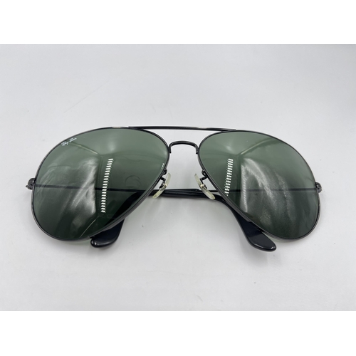 2339 - A cased pair of Ray-Ban Aviator sunglasses