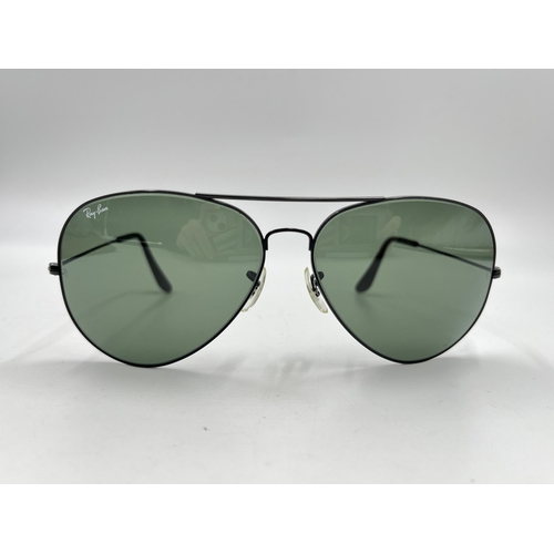 2339 - A cased pair of Ray-Ban Aviator sunglasses