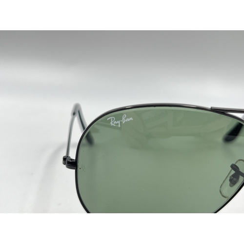 2339 - A cased pair of Ray-Ban Aviator sunglasses