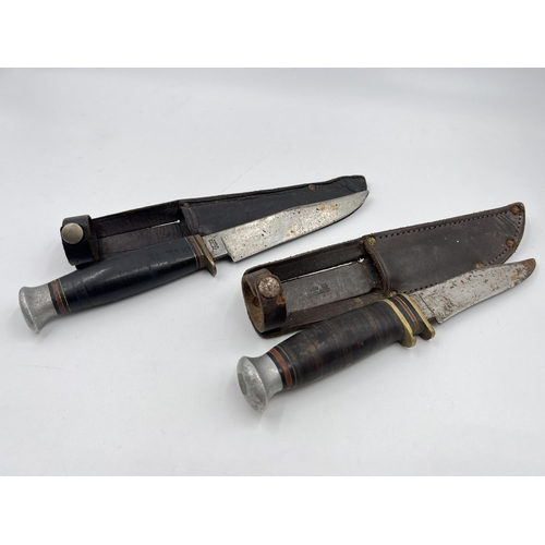 2342 - Two William Rodgers hunting knives with leather sheaths