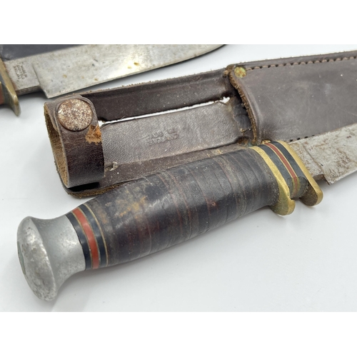 2342 - Two William Rodgers hunting knives with leather sheaths