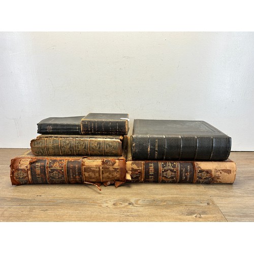 558 - Six antique leather bound books, five Holy Bibles and one The Life & Explorations of Dr. Livingstone... 