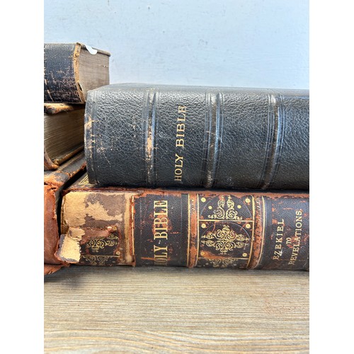 558 - Six antique leather bound books, five Holy Bibles and one The Life & Explorations of Dr. Livingstone... 