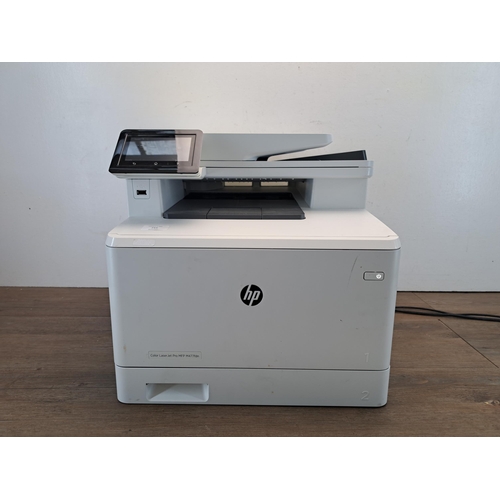 800 - An HP MFP M477fdn Color Laser Jet Pro printer