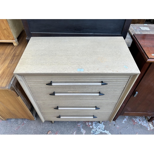 32 - A 1960s Lebus Link Furniture limed oak chest of drawers - approx. 98cm high x 76cm wide x 42cm deep