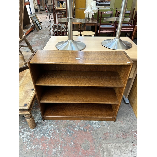 48 - An oak effect three tier open bookcase