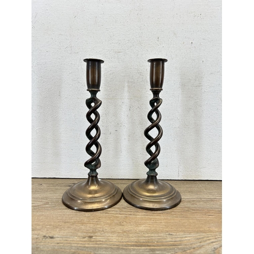 422 - A pair of 19th century copper spiral candlesticks - approx. 26cm high