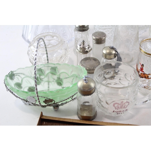 387 - A collection of kitchenware to include cut glass sugar shaker, bottles, jug etc.