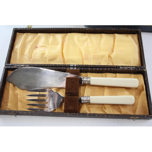 447 - Three sets of vintage mother of pearl and ivorine fish cutlery