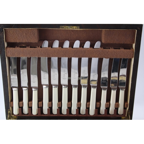 448 - Three vintage silver plated fish cutlery sets in wooden canteens