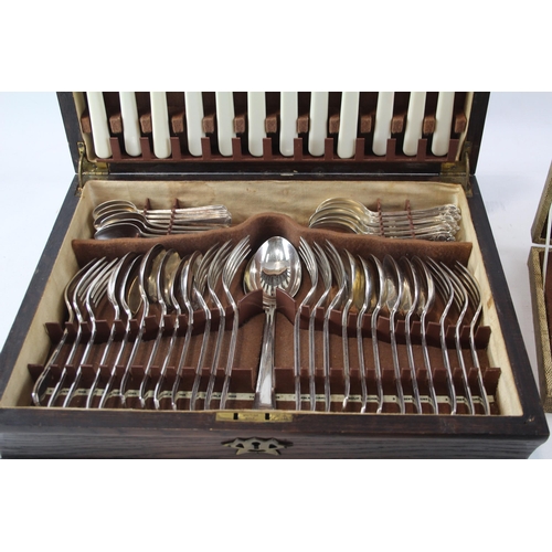 448 - Three vintage silver plated fish cutlery sets in wooden canteens