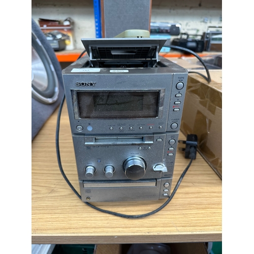 717 - A Sony CMT-CP505MD micro hi-fi system comprising MiniDisc player, CD player, tuner, cassette player ... 