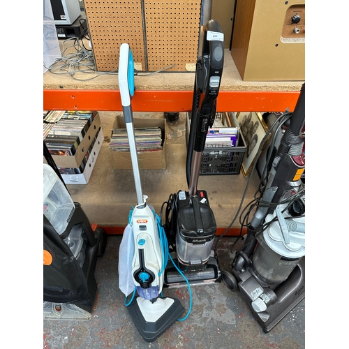 850 - Two cleaners, one Shark life-away upright bagless vacuum cleaner and one Vax steam cleaner with bagg... 