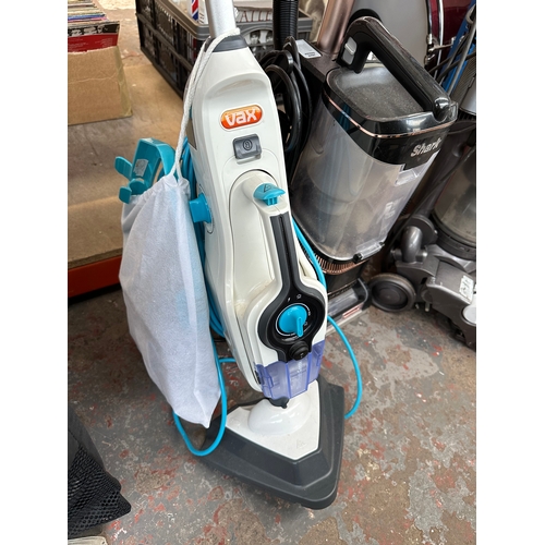 850 - Two cleaners, one Shark life-away upright bagless vacuum cleaner and one Vax steam cleaner with bagg... 