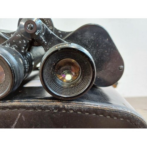 680 - A cased pair of Russian БЛБ1 12 x 40 binoculars