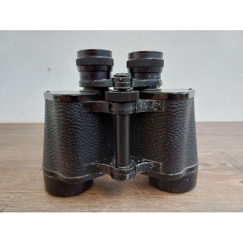 680 - A cased pair of Russian БЛБ1 12 x 40 binoculars