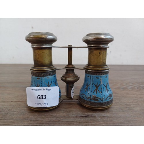 683 - A pair of antique opera glasses with blue enamel decoration