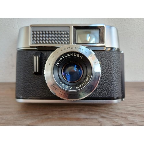 685 - A cased 1960s Voigtländer Vito Automatic I 35mm viewfinder camera fitted with Lanthar 2.8/50 lens an... 