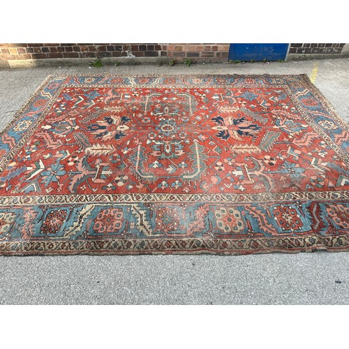 27 - An antique Persian hand knotted rug - approx. 360cm x 305cm