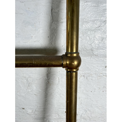 457 - Two 19th century copper and brass towel rails, one heated and one other - heated approx. 94cm high x... 