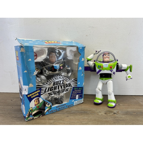 496 - Two Walt Disney Toy Story Buzz Lightyear figurines, one boxed Intergalactic and one unboxed