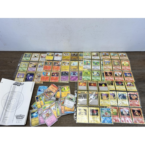 497 - A collection of Pokémon trading cards to include Unified Minds, Burning Shadows, 1999 Fossil and Tea... 