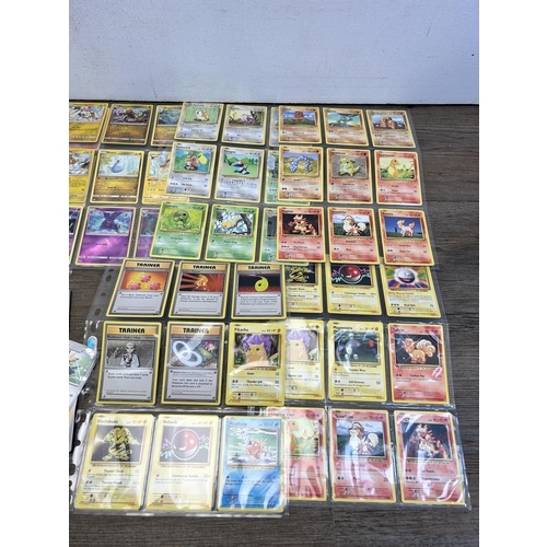 497 - A collection of Pokémon trading cards to include Unified Minds, Burning Shadows, 1999 Fossil and Tea... 