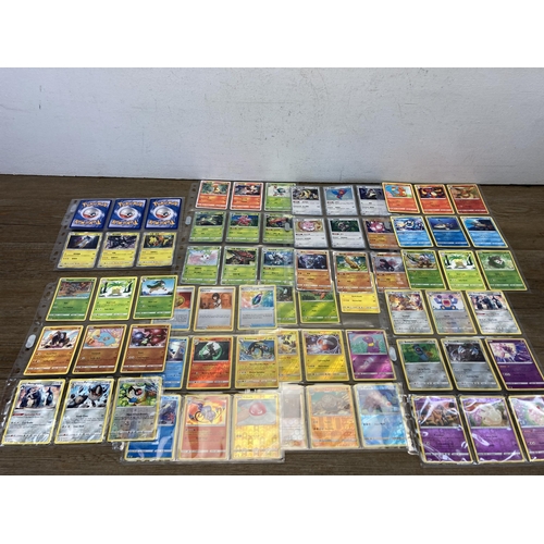 498 - A collection of Pokémon trading cards to include Chinese Hidden Fates, Vivid Voltage part set etc.