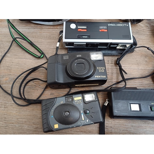 692 - Twelve cameras to include cased Canon 105 and 60 Zoom, cased Minolta Autopak 460Tx, Pentax Espio 110... 