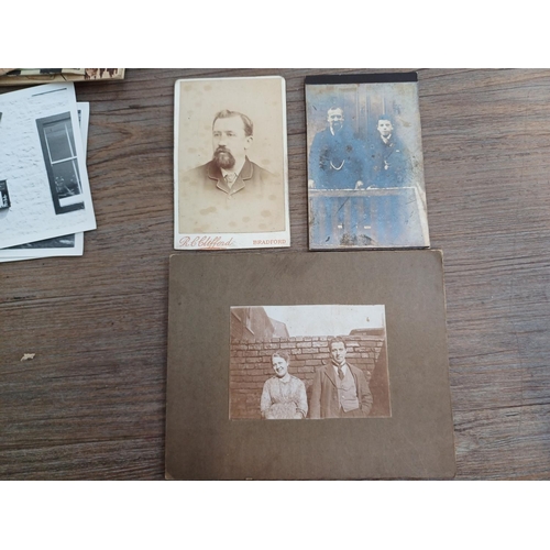 693 - A collection of vintage photographs, negatives and glass magic lantern slides to include Graystone B... 