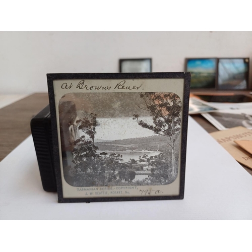 693 - A collection of vintage photographs, negatives and glass magic lantern slides to include Graystone B... 