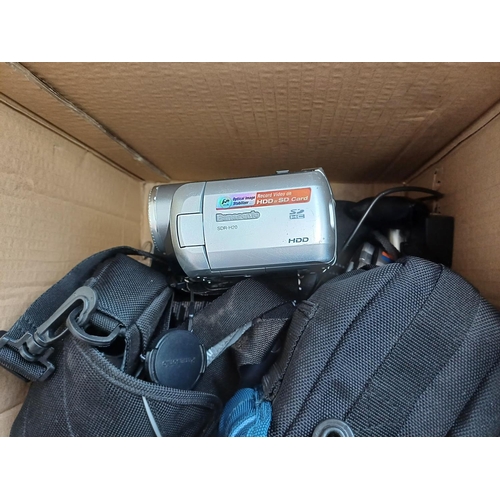 698 - Two boxes containing sealed Sony DVD+RW and DVD-RW discs, cased and boxed camcorders to include Cano... 