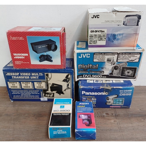 704 - Seven boxed items to include JVC and Panasonic digital camcorders, Praktica BC3600 flashgun, Jessop ... 