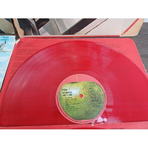 760 - Five The Beatles related vinyl records, red vinyl '1962-1966' 2LP, 'Abbey Road' LP, John Lennon 'Sha... 