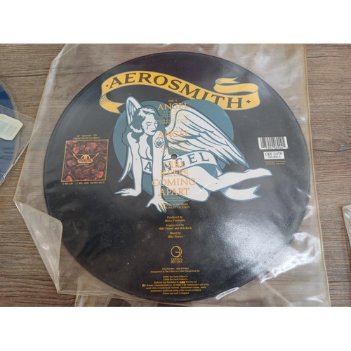 766 - Eight rock picture discs, two Iron maiden, Quireboys, Bon Jovi, Poison, Aerosmith, Marillion and Sax... 