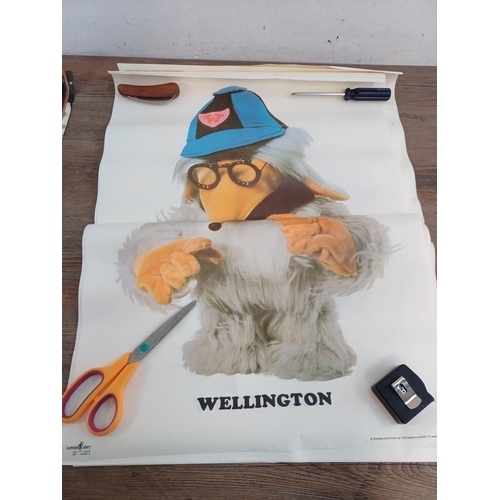 773 - A collection of vintage gift wrap/posters to include The Wombles etc.