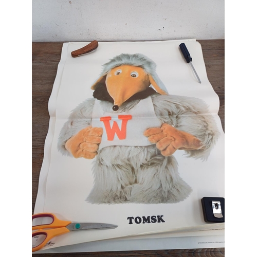 773 - A collection of vintage gift wrap/posters to include The Wombles etc.