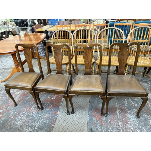 221 - Four walnut dining chairs