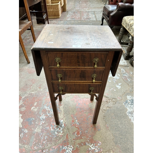 104 - An Edwardian mahogany three drawer drop leaf work table - approx. 73cm high x 71cm wide x 30.5cm dee... 