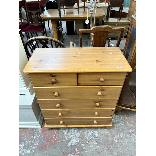 105 - A pine chest of drawers - approx. 90cm high x 83cm wide x 38cm deep