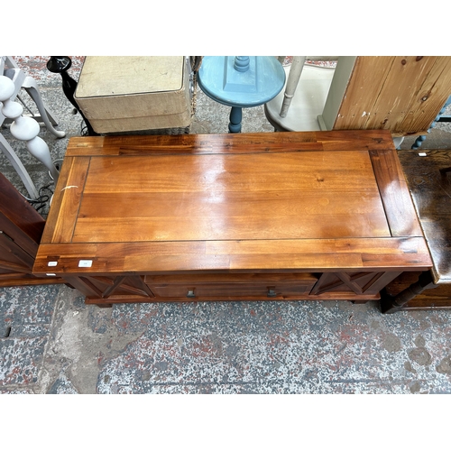 116 - A Morris Furniture Company pine coffee table - approx. 50cm high x 55cm wide x 120cm long