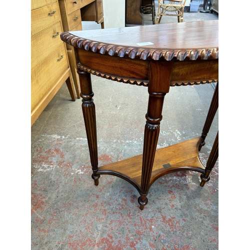 133A - An Ancient Mariner mahogany half moon console table - approx. 71cm high x 73cm wide x 30cm deep