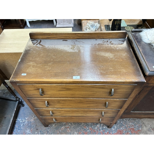 155 - A mid 20th century oak chest of drawers - approx. 94cm high x 76cm wide x 42cm deep