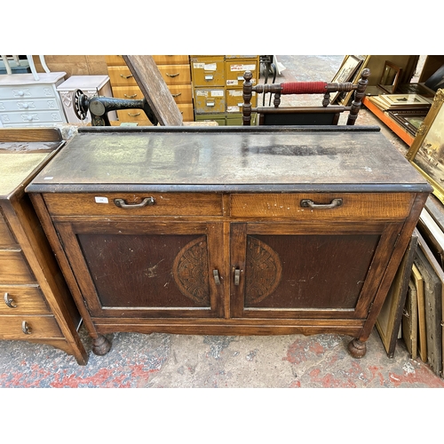 156 - A mid 20th century carved oak sideboard - approx. 93cm high x 122cm wide x 42cm deep