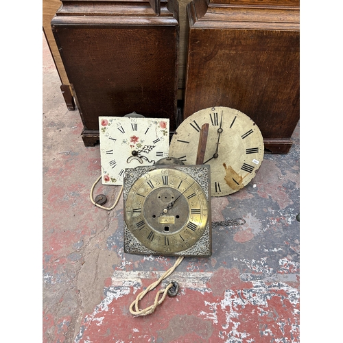 158 - Two Georgian oak cased grandfather clocks with accessories to include three faces and movements etc.