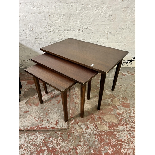 165 - Two nests of tables, one mahogany and one teak