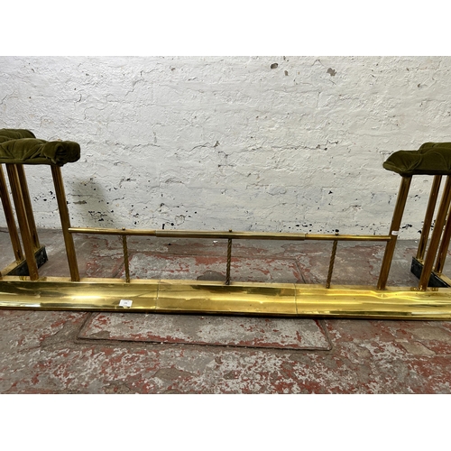 170 - A brass and green fabric upholstered club fender - approx. 52cm high x 164cm wide x 34cm deep