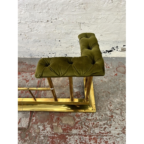 170 - A brass and green fabric upholstered club fender - approx. 52cm high x 164cm wide x 34cm deep