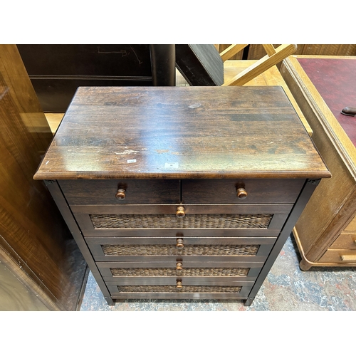 18 - A modern hardwood and wicker chest of drawers - approx. 105cm high x 81 cm wide x 48 cm deep